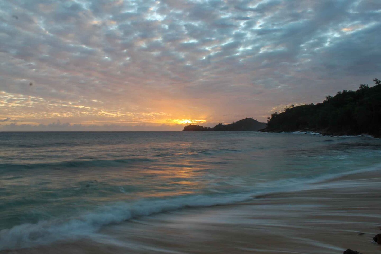 sunset over a beach Seychelles